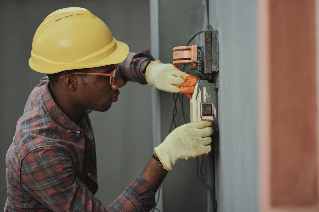 Technician working on home maintenance